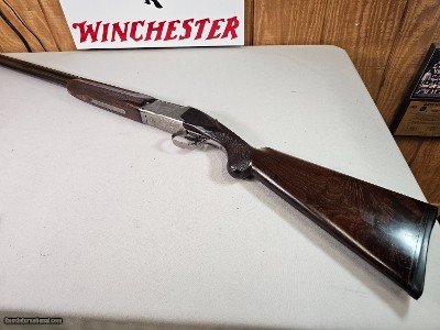 9082
Winchester 101 Super grade XTR, (Pigeon) 12 Gauge, M/F 28” Barrels, Round Knob, 14 1/2 LOP, butt pad, vent rib,
AA++, fancy tiger striped feath