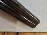 9082
Winchester 101 Super grade XTR, (Pigeon) 12 Gauge, M/F 28” Barrels, Round Knob, 14 1/2 LOP, butt pad, vent rib,
AA++, fancy tiger striped feath - 14 of 25