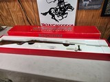 9084
Winchester 52B, Bolt action rifle, 22 Long Rifle, 24 “ barrel, ebony forearm tip, NIB. more pictures at dawsonsdoubles.com