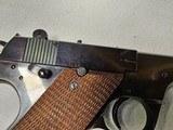 9086
Hi Standard H-D Military, 22 LR, 99%, Excellent collectors condition, 4 1/2 barrel, high luster blued, 1946 manufactured, more pictures at dawso - 9 of 16