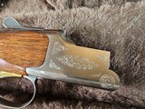 9085
Browning Citori Lightning feather, 20 Gauge, 28” barrels, 2 3/4 and 3”, round knob, Kickeze pad, 13 1/2 LOP, Gold feather on bottom of receiver, - 11 of 25