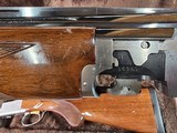 9085
Browning Citori Lightning feather, 20 Gauge, 28” barrels, 2 3/4 and 3”, round knob, Kickeze pad, 13 1/2 LOP, Gold feather on bottom of receiver, - 23 of 25