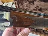9085
Browning Citori Lightning feather, 20 Gauge, 28” barrels, 2 3/4 and 3”, round knob, Kickeze pad, 13 1/2 LOP, Gold feather on bottom of receiver, - 20 of 25