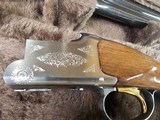 9085
Browning Citori Lightning feather, 20 Gauge, 28” barrels, 2 3/4 and 3”, round knob, Kickeze pad, 13 1/2 LOP, Gold feather on bottom of receiver, - 6 of 25