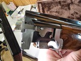 9085
Browning Citori Lightning feather, 20 Gauge, 28” barrels, 2 3/4 and 3”, round knob, Kickeze pad, 13 1/2 LOP, Gold feather on bottom of receiver, - 21 of 25