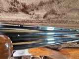 9085
Browning Citori Lightning feather, 20 Gauge, 28” barrels, 2 3/4 and 3”, round knob, Kickeze pad, 13 1/2 LOP, Gold feather on bottom of receiver, - 17 of 25