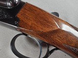 9093
Browning
BSS 20 Gauge, 2 3/4 and 3”, single trigger, butt plate, pistol grip, 26” barrels, 14 LOP, factory engraved, brass bead, ejectors, 97%, - 7 of 25