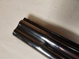 9105
Charles Daly, field hunter ultra light, 20 gauge, 26” barrels, IC/M, Vent rib, butt plate, gold trigger, brass bead, 98% box, 13 3/4, More pictu - 11 of 24