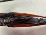 9105
Charles Daly, field hunter ultra light, 20 gauge, 26” barrels, IC/M, Vent rib, butt plate, gold trigger, brass bead, 98% box, 13 3/4, More pictu - 13 of 24