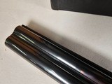 9090
Browning Citori, 16 Gauge, 2 3/4, 26” Barrels, 14 1/4 LOP, Invector Plus chokes, F/M, Butt plate, Vent Rib, Round Knob, 2 extra chokes, wrench, - 12 of 25
