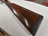 9103
Arrieta SXS Shotgun, 20 Gauge, 28” Barrels, Cycl/IC, Double triggers, ejectors, splinter forearm, straight grip, 7 pin side lock, engraved, but - 2 of 25