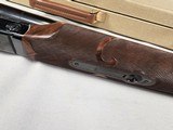 9111
Classic Doubles 12 gauge, 26 “ Barrels, IC/MOD, AA++ Marbled Walnut, Butt pad, vent rib, ejectors, Pistol grip with cap, 14 1/2 LOP,
Box and pa - 21 of 25