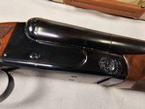 9111
Classic Doubles 12 gauge, 26 “ Barrels, IC/MOD, AA++ Marbled Walnut, Butt pad, vent rib, ejectors, Pistol grip with cap, 14 1/2 LOP,
Box and pa - 22 of 25