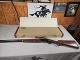 9111
Classic Doubles 12 gauge, 26 “ Barrels, IC/MOD, AA++ Marbled Walnut, Butt pad, vent rib, ejectors, Pistol grip with cap, 14 1/2 LOP,
Box and pa