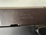 9109 Mauser Sig Sauer M2 45 Cal, Friends of NRA, 2 8 round magazines, display box with key, double action only, combat sights, 3.5 barrel, 32 OZ,
Mo - 12 of 17