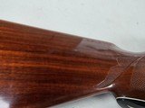 9071  Remington 1100 20 Gauge, Mod Fixed, 28” barrel,  Plain Barrel, Pachmayer pad, LOP 13 1/2, . more pictures at dawsonsdoubles.com - 24 of 25