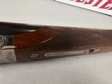 9115
Winchester Model 23 Pigeon Grade,
12 Gauge 2 3/4 and 3”, 28” barrels, M/F, single selective trigger, ejectors, vent rib, round knob, 2 white be - 25 of 25