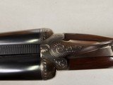 9115
Winchester Model 23 Pigeon Grade,
12 Gauge 2 3/4 and 3”, 28” barrels, M/F, single selective trigger, ejectors, vent rib, round knob, 2 white be - 19 of 25