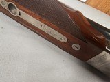 9115
Winchester Model 23 Pigeon Grade,
12 Gauge 2 3/4 and 3”, 28” barrels, M/F, single selective trigger, ejectors, vent rib, round knob, 2 white be - 12 of 25