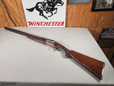 9115
Winchester Model 23 Pigeon Grade,
12 Gauge 2 3/4 and 3”, 28” barrels, M/F, single selective trigger, ejectors, vent rib, round knob, 2 white be
