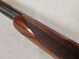 9115
Winchester Model 23 Pigeon Grade,
12 Gauge 2 3/4 and 3”, 28” barrels, M/F, single selective trigger, ejectors, vent rib, round knob, 2 white be - 11 of 25