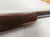 9115
Winchester Model 23 Pigeon Grade,
12 Gauge 2 3/4 and 3”, 28” barrels, M/F, single selective trigger, ejectors, vent rib, round knob, 2 white be - 23 of 25