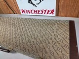 9185
Winchester Diamond Grade shotgun case. This is a rare case that will hold two barrels. Has been used. This case will hold up to 34” barrels. Mor - 3 of 25