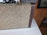 9185
Winchester Diamond Grade shotgun case. This is a rare case that will hold two barrels. Has been used. This case will hold up to 34” barrels. Mor - 9 of 25