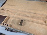 9185
Winchester Diamond Grade shotgun case. This is a rare case that will hold two barrels. Has been used. This case will hold up to 34” barrels. Mor - 18 of 25