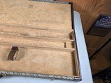 9185
Winchester Diamond Grade shotgun case. This is a rare case that will hold two barrels. Has been used. This case will hold up to 34” barrels. Mor - 16 of 25