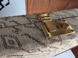 9185
Winchester Diamond Grade shotgun case. This is a rare case that will hold two barrels. Has been used. This case will hold up to 34” barrels. Mor - 15 of 25