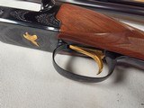 9191
Winchester 23 Classic 20 Gauge, 26” barrels, IC/Mod, 14 1/4 LOP. Beautiful side x side, possibly unfired shotgun, all paperwork, all inserts and - 9 of 24