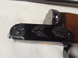 9191
Winchester 23 Classic 20 Gauge, 26” barrels, IC/Mod, 14 1/4 LOP. Beautiful side x side, possibly unfired shotgun, all paperwork, all inserts and - 11 of 24