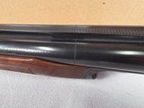 9191
Winchester 23 Classic 20 Gauge, 26” barrels, IC/Mod, 14 1/4 LOP. Beautiful side x side, possibly unfired shotgun, all paperwork, all inserts and - 23 of 24