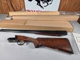 9191
Winchester 23 Classic 20 Gauge, 26” barrels, IC/Mod, 14 1/4 LOP. Beautiful side x side, possibly unfired shotgun, all paperwork, all inserts and - 3 of 24