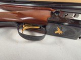 9191
Winchester 23 Classic 20 Gauge, 26” barrels, IC/Mod, 14 1/4 LOP. Beautiful side x side, possibly unfired shotgun, all paperwork, all inserts and - 13 of 24