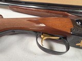 9191
Winchester 23 Classic 20 Gauge, 26” barrels, IC/Mod, 14 1/4 LOP. Beautiful side x side, possibly unfired shotgun, all paperwork, all inserts and - 14 of 24