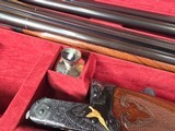9194 Winchester 23 CUSTOM 2 BARREL HUNT SET WBS, 28 gauge and 20 Gauge barrels,
both are 26 inch barrels, both are ic/mod, raised solid rib, ejectors - 20 of 25