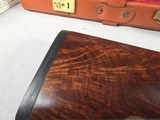 9194 Winchester 23 CUSTOM 2 BARREL HUNT SET WBS, 28 gauge and 20 Gauge barrels,
both are 26 inch barrels, both are ic/mod, raised solid rib, ejectors - 18 of 25