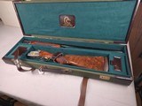 9196
SKB 605 20 Gauge, 28” barrels, NIB, Ducks Unlimited Shotgun, Screw in chokes X 3, and choke wrench, gold inlays, beautiful wood, butt pad, pist - 2 of 25