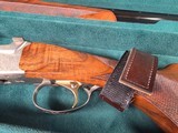 9196
SKB 605 20 Gauge, 28” barrels, NIB, Ducks Unlimited Shotgun, Screw in chokes X 3, and choke wrench, gold inlays, beautiful wood, butt pad, pist - 6 of 25