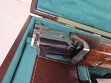 9196
SKB 605 20 Gauge, 28” barrels, NIB, Ducks Unlimited Shotgun, Screw in chokes X 3, and choke wrench, gold inlays, beautiful wood, butt pad, pist - 24 of 25