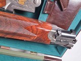 9196
SKB 605 20 Gauge, 28” barrels, NIB, Ducks Unlimited Shotgun, Screw in chokes X 3, and choke wrench, gold inlays, beautiful wood, butt pad, pist - 23 of 25