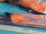 9196
SKB 605 20 Gauge, 28” barrels, NIB, Ducks Unlimited Shotgun, Screw in chokes X 3, and choke wrench, gold inlays, beautiful wood, butt pad, pist - 21 of 25