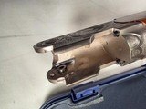 9201
Beretta 687 Silver Pigeon III, 30” barrels, 28 Gauge, 3”, NIB, 5 choke tubes, Paperwork, has the original unused kit, 14 3/4 LOP, Butt pad, vent - 19 of 25