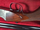 9207
Winchester 101 lightweight 12 gauge, screw in winchokes x 5 ( M, IM, XF, IC, SK) 27” barrels, 14 1/4 LOP, Butt pad, vent rib, ejectors, pistol g - 14 of 25