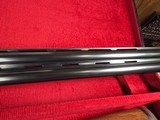 9207
Winchester 101 lightweight 12 gauge, screw in winchokes x 5 ( M, IM, XF, IC, SK) 27” barrels, 14 1/4 LOP, Butt pad, vent rib, ejectors, pistol g - 20 of 25