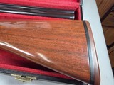 9207
Winchester 101 lightweight 12 gauge, screw in winchokes x 5 ( M, IM, XF, IC, SK) 27” barrels, 14 1/4 LOP, Butt pad, vent rib, ejectors, pistol g - 2 of 25