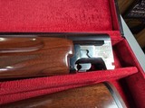 9207
Winchester 101 lightweight 12 gauge, screw in winchokes x 5 ( M, IM, XF, IC, SK) 27” barrels, 14 1/4 LOP, Butt pad, vent rib, ejectors, pistol g - 25 of 25