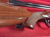 9207
Winchester 101 lightweight 12 gauge, screw in winchokes x 5 ( M, IM, XF, IC, SK) 27” barrels, 14 1/4 LOP, Butt pad, vent rib, ejectors, pistol g - 15 of 25